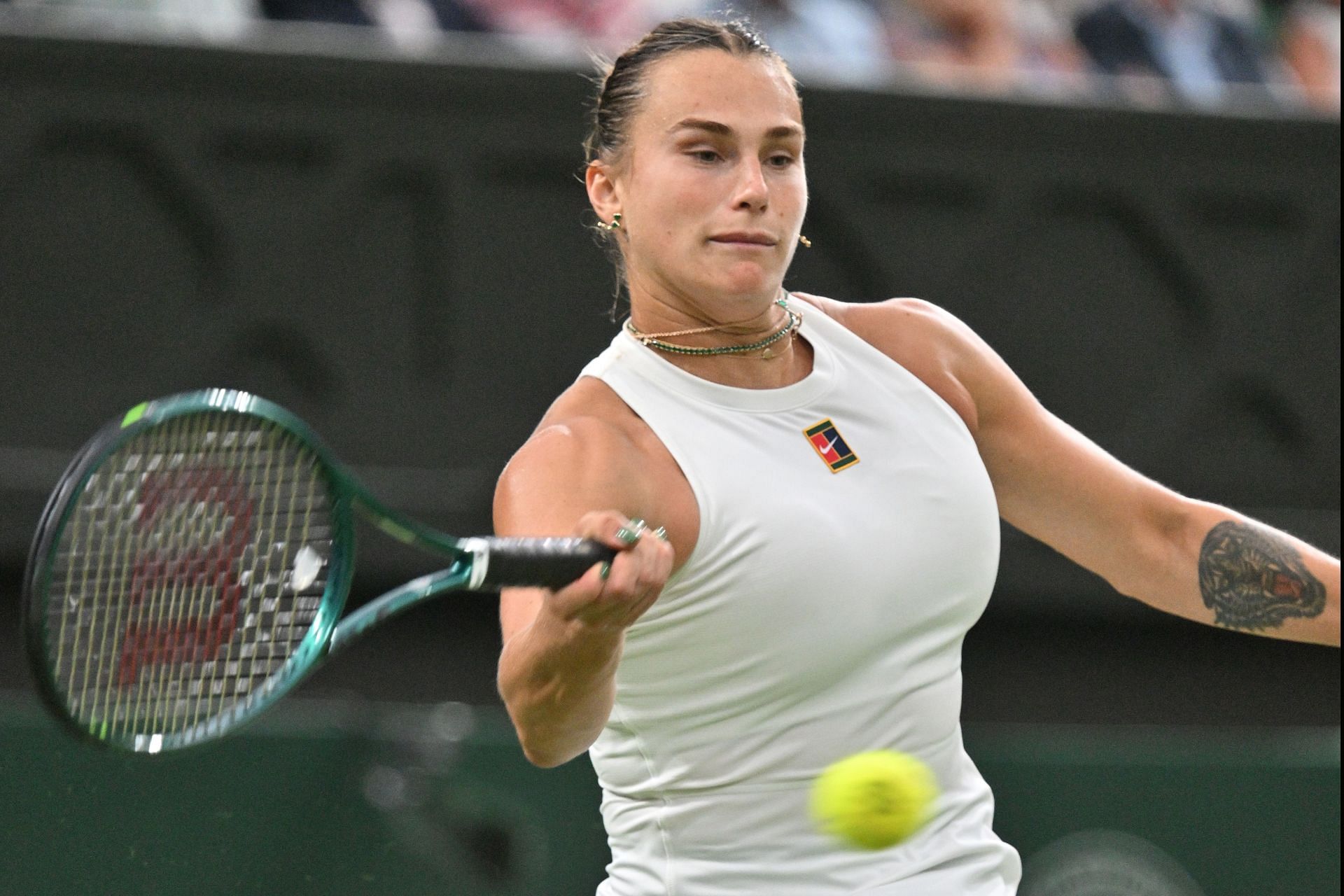 Sabalenka hits a forehand at Wimbledon | Image Source: Getty